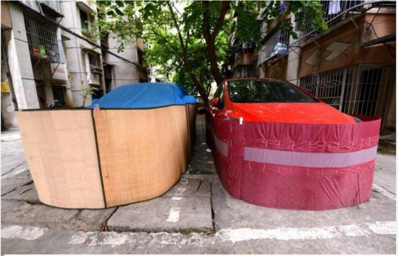"Ванна" для авто? Почему в одном из городов Китая машины паркуют подобным образом