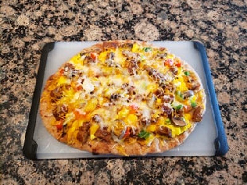 Пицца на завтрак для ваших родных и близких: простой и быстрый рецепт в четыре шага