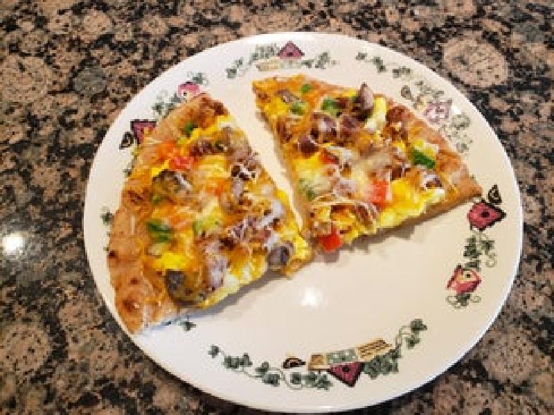 Пицца на завтрак для ваших родных и близких: простой и быстрый рецепт в четыре шага
