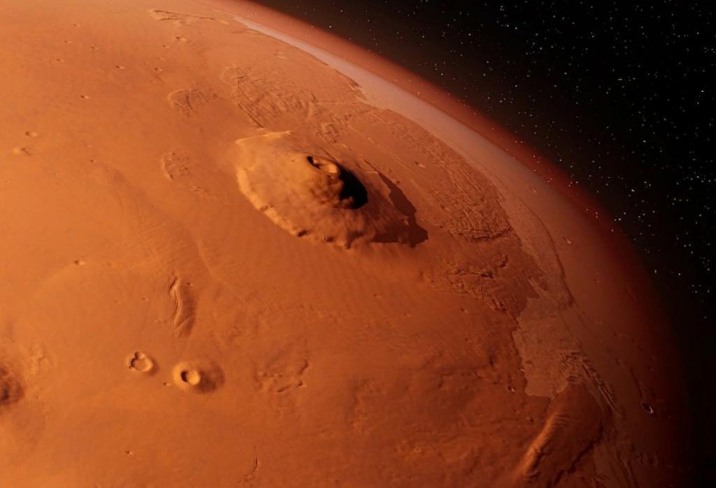 Впечатляющие снимки самого большого каньона Солнечной системы, расположенного на Марсе, опубликовало НАСА