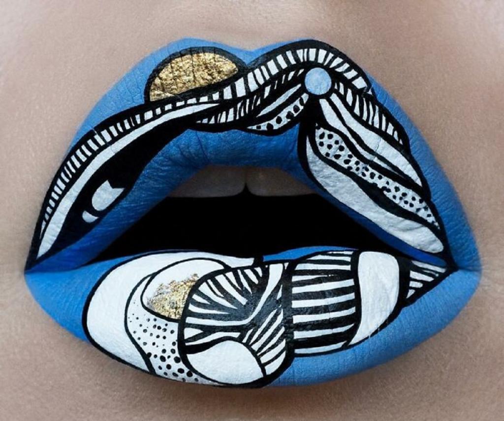 Андреа Рид - визажист, фотограф и модель, которая известна тем, что превращает губы в красочные шедевры