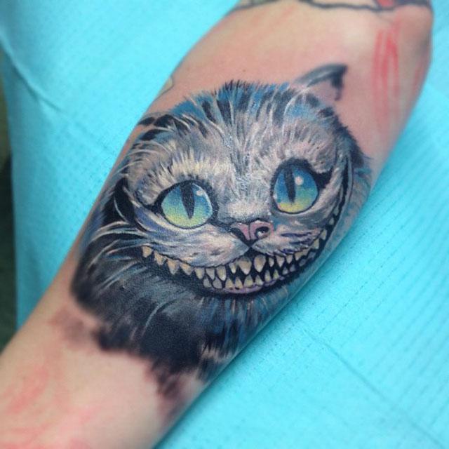 татуировка чеширский кот