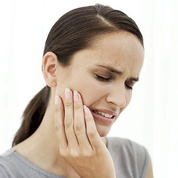 болит десна в конце нижней челюсти десна лезет на зуб 