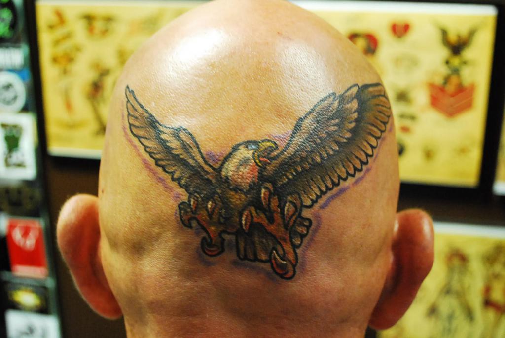 Татуировки на голове: достоинства и недостатки