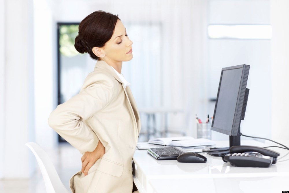 почему болит спина у женщин
