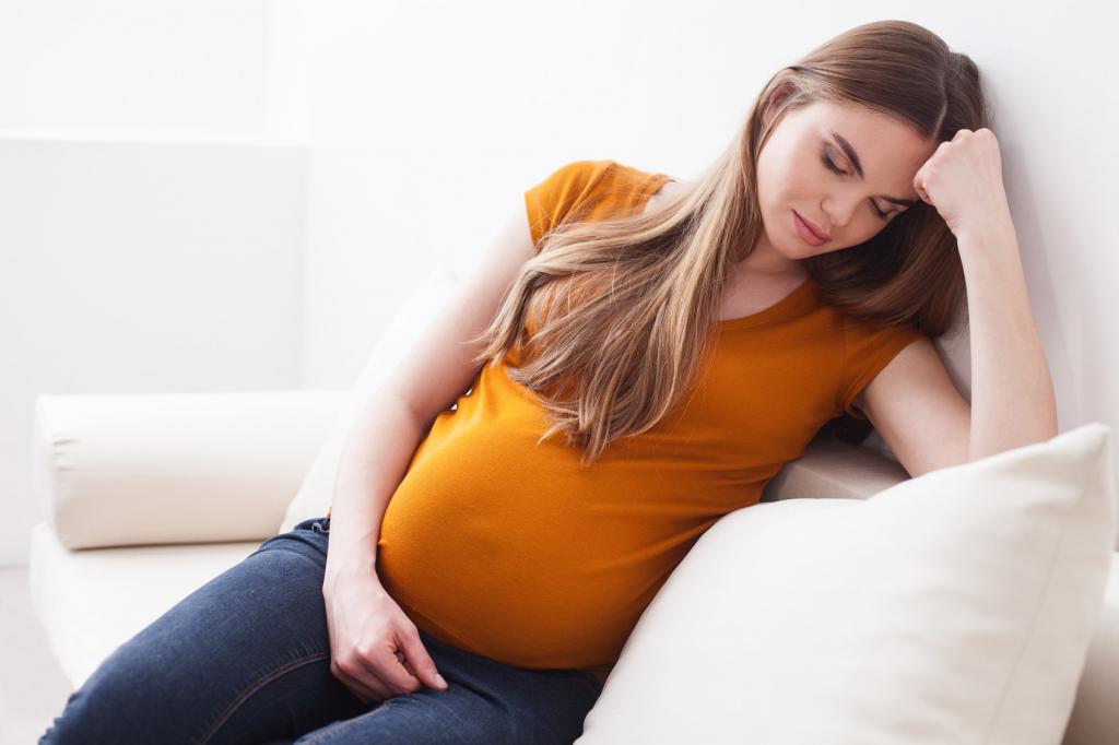 снится беременная женщина с большим животом