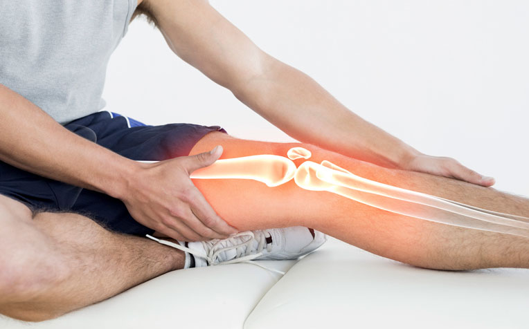причины боли в колено