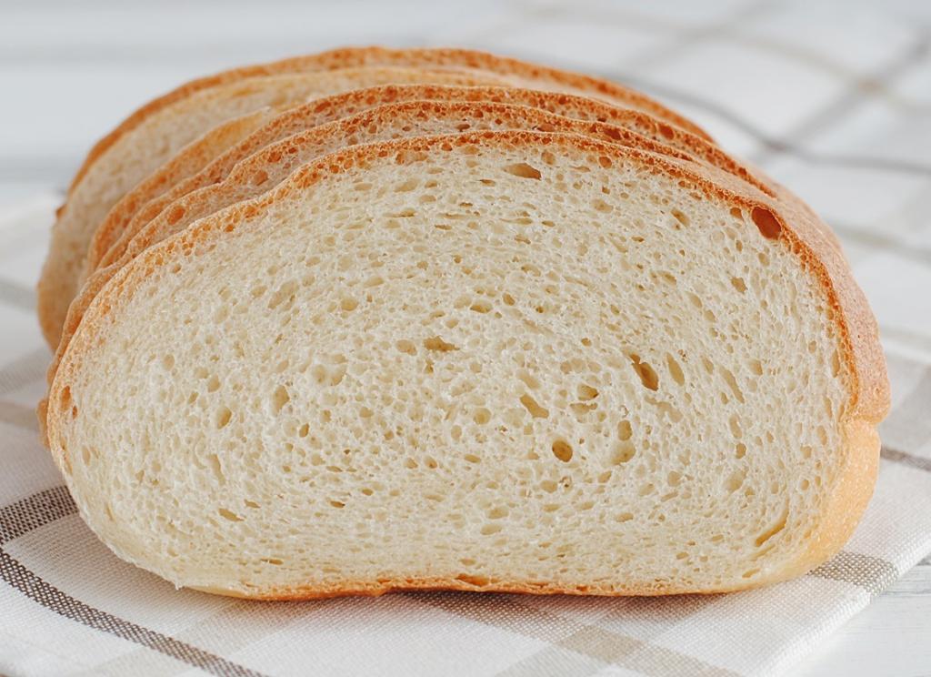 Приготовление хлеба из пшеничной муки. Хлеб пшеничный подовый 400. Хлеб пшеничный подовый 550. Рустикальный пшеничный хлеб. Белый пшеничный хлеб.