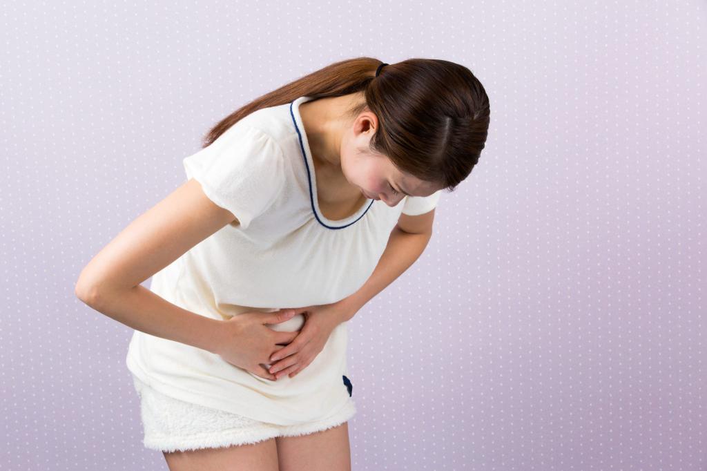 can the stomach hurt during ovulation