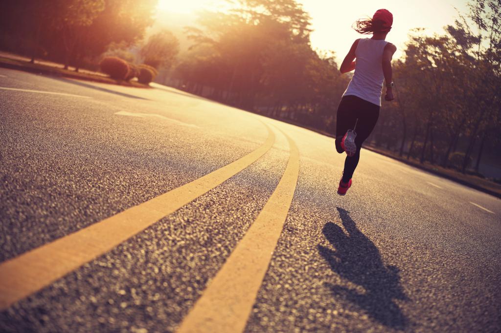 girl runs on the road