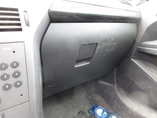 The filter is located behind the glove compartment