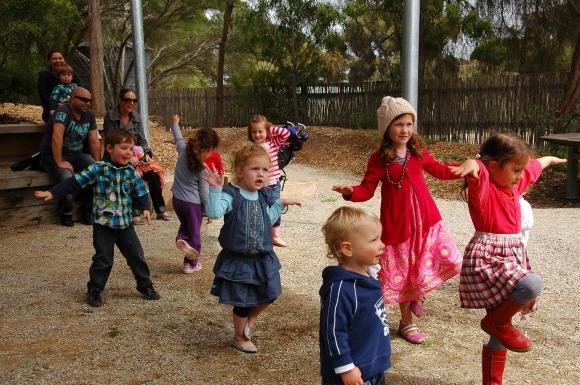 children for a walk in kindergarten