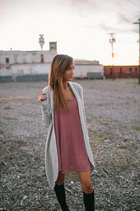 A beige knit cardigan with something to wear