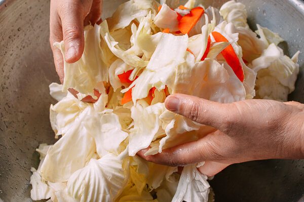 Hand stirring vegetables