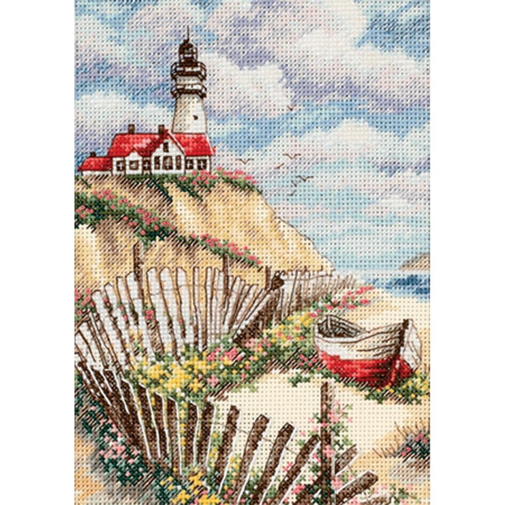 Embroidery with a lighthouse on the mountain