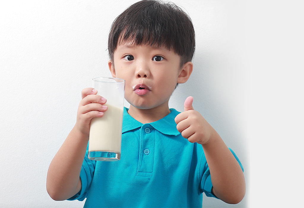 Child drinks milk drink