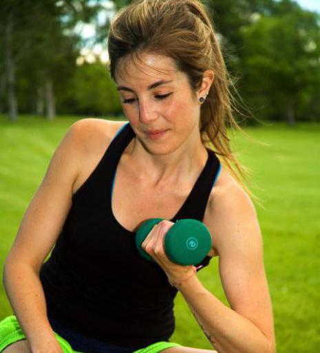 lifting dumbbells standing with supination