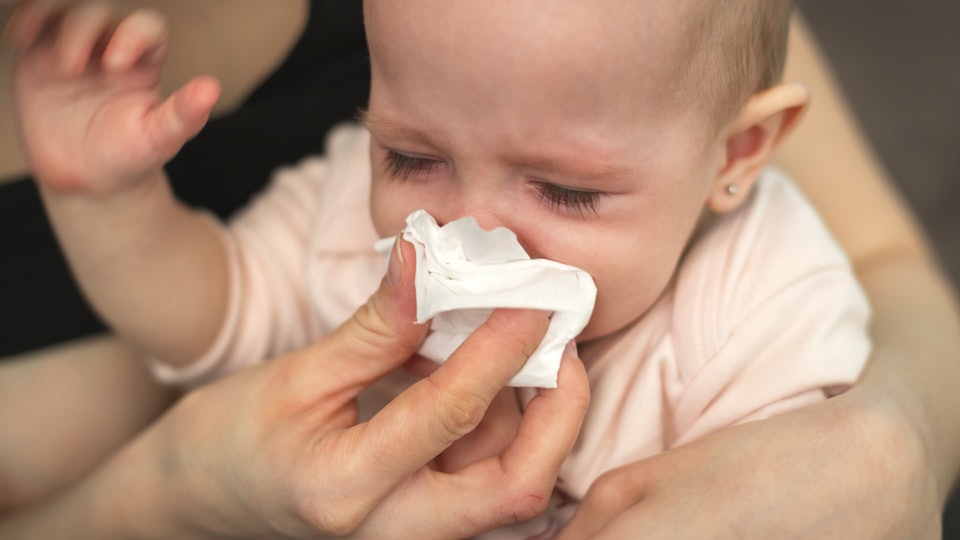 what is the difference between allergy and flowering in newborns