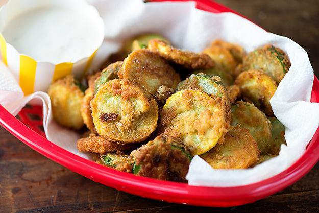 fried zucchini in flour in a pan