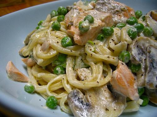 spaghetti with salmon in a creamy sauce