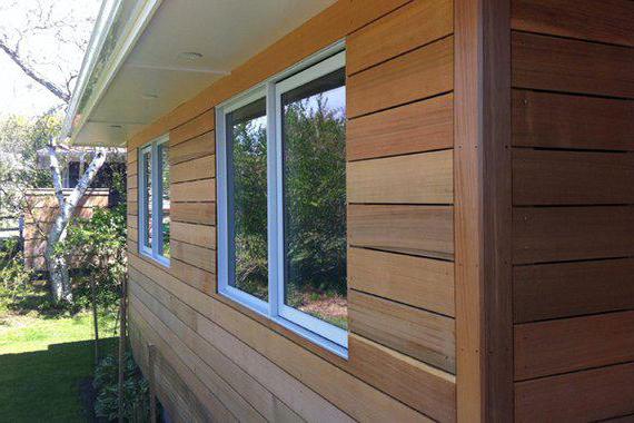 siding under a bar photo of houses