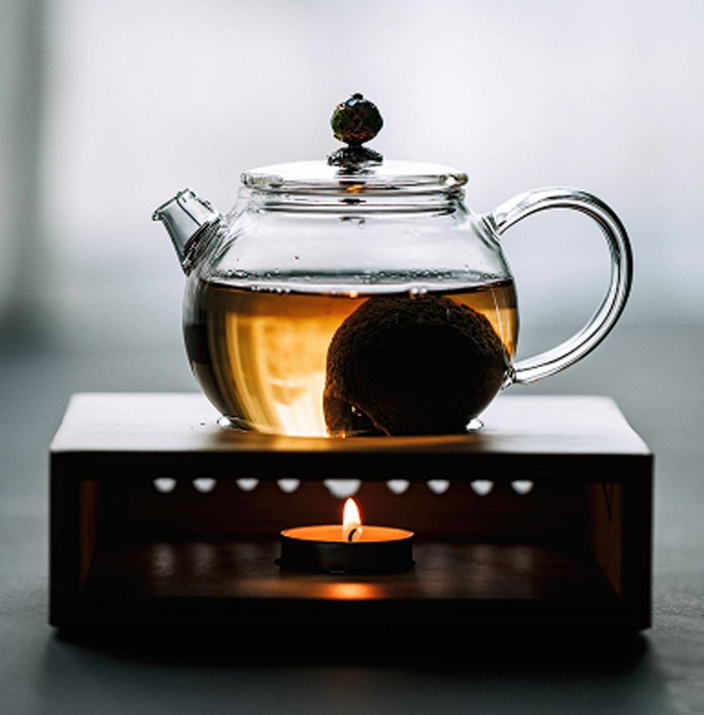 tea candle and teapot