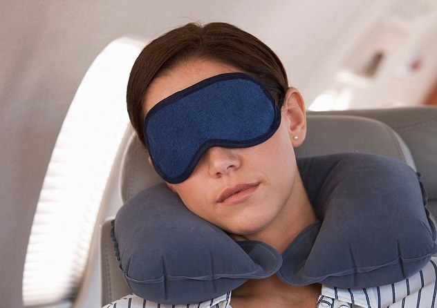 how to fall asleep in an airplane