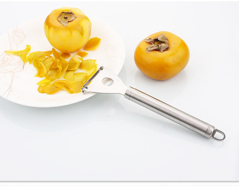 Horizontal manual peeler