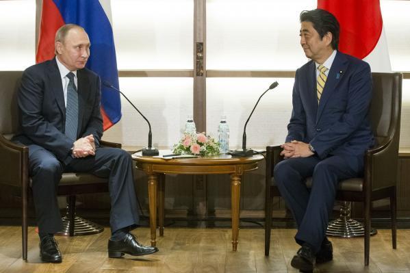 Путин и премьер Японии