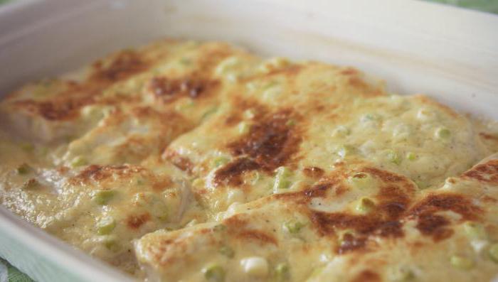 pollock in the oven with mayonnaise and onions