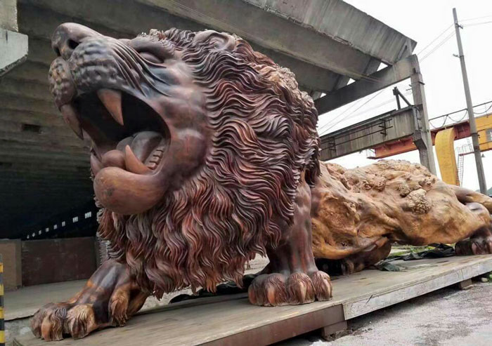 Wooden sculpture of a lion