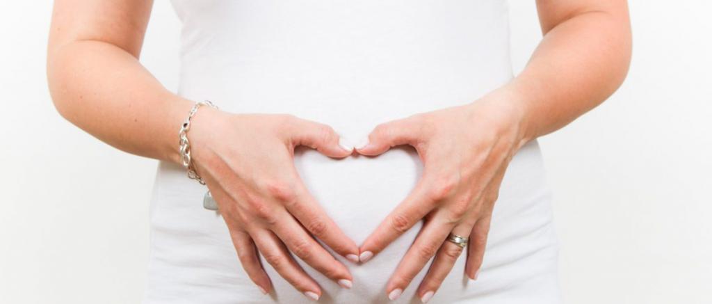 Живот при беременности двойней