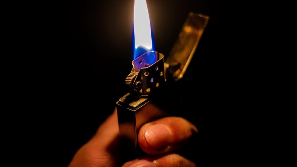 Light from the flame of a lighter.