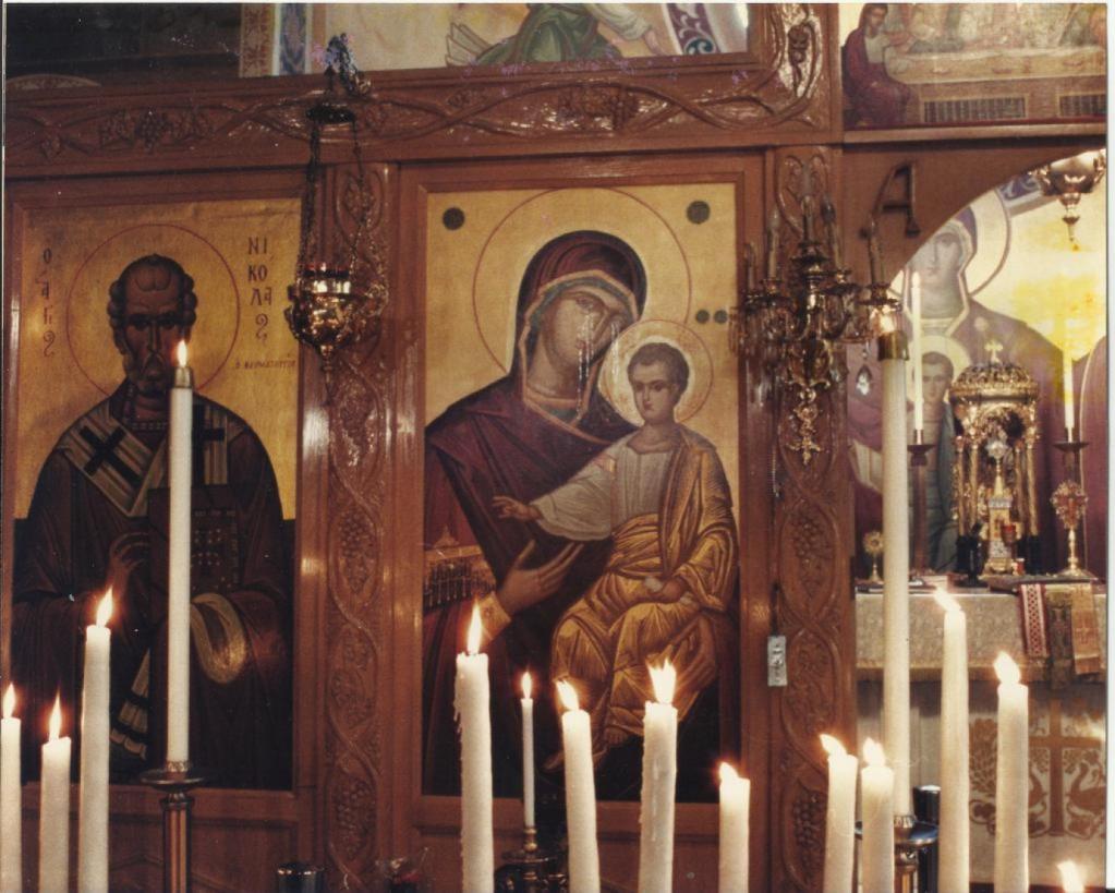 Православная икона со свечой