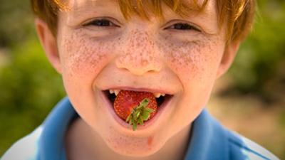 from what age to give a child strawberries