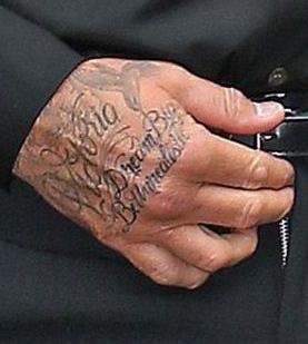 Beckham tattoo on the back