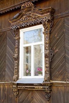 carved platbands on the windows photo