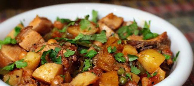 roast pork with potatoes in a slow cooker