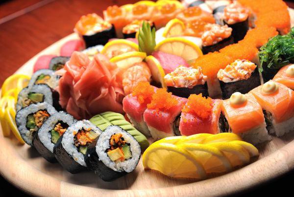 sushi and fish slices in the daily menu for the family
