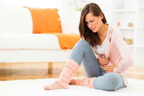Burning and pain in the lower abdomen in women with cystitis