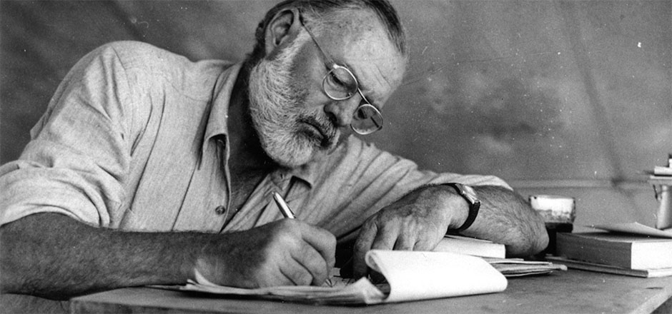 E. Hemingway at work