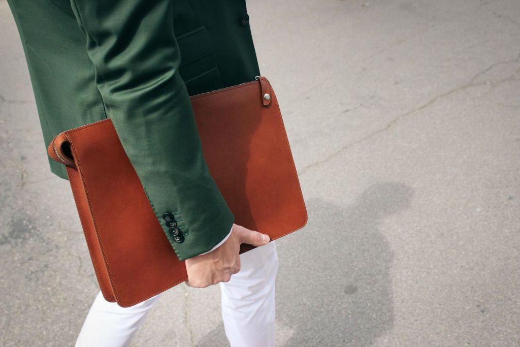 folder in the hands of an employee