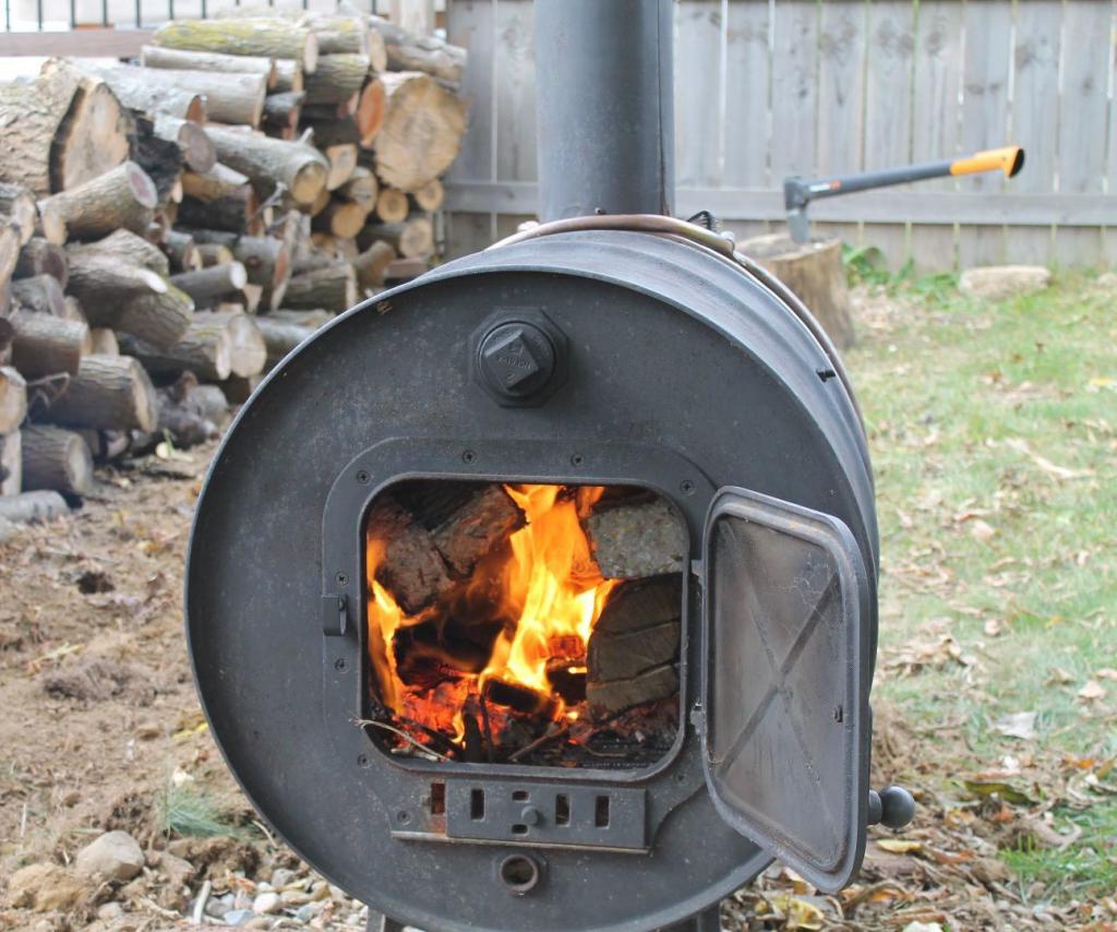 Экономичная дровяная печь для гаража длительного горения - особенности .