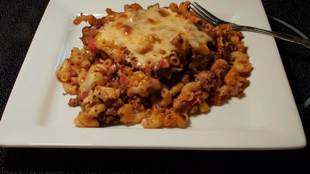 meat under cheese with pasta