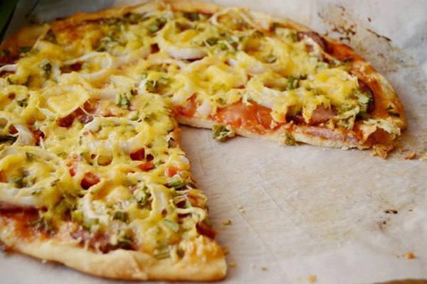 pizza with sausage and chicken