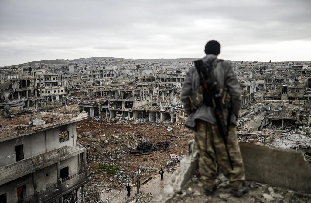 разрушенный город в сирии