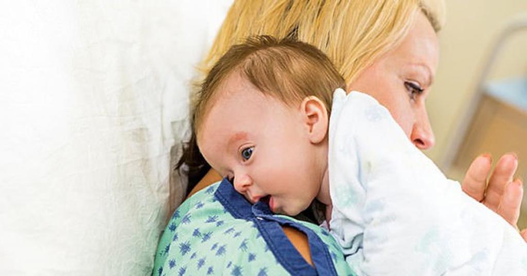 Why a newborn spits up after feeding