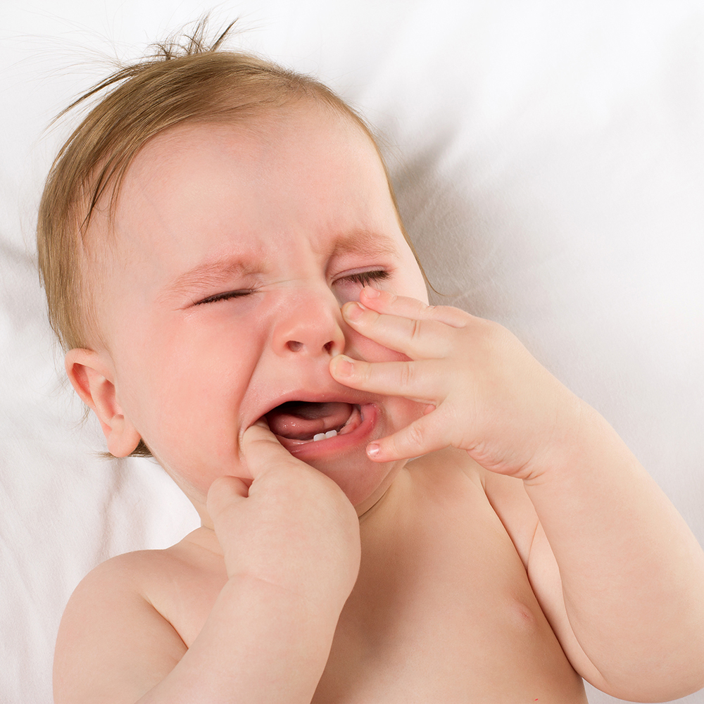 Прорезывание зубов у ребенка