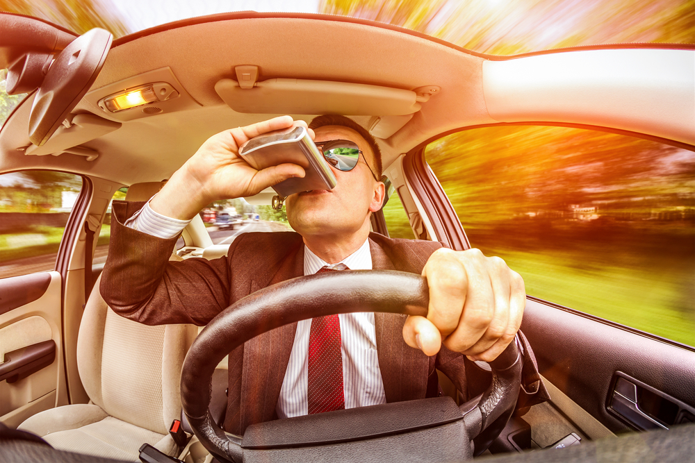 the driver drinks while driving