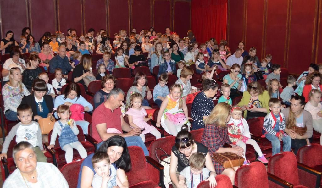 Spectators at the Puppet Theater